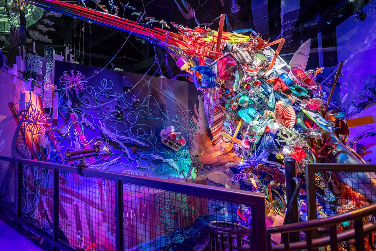 lots of recycled materials making a tornado shape at Meow Wolf Houston